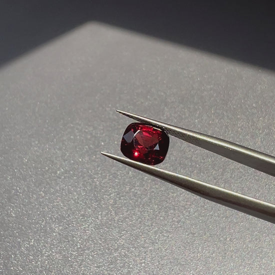 A deep, rich Burmese red spinel with a brilliant glow