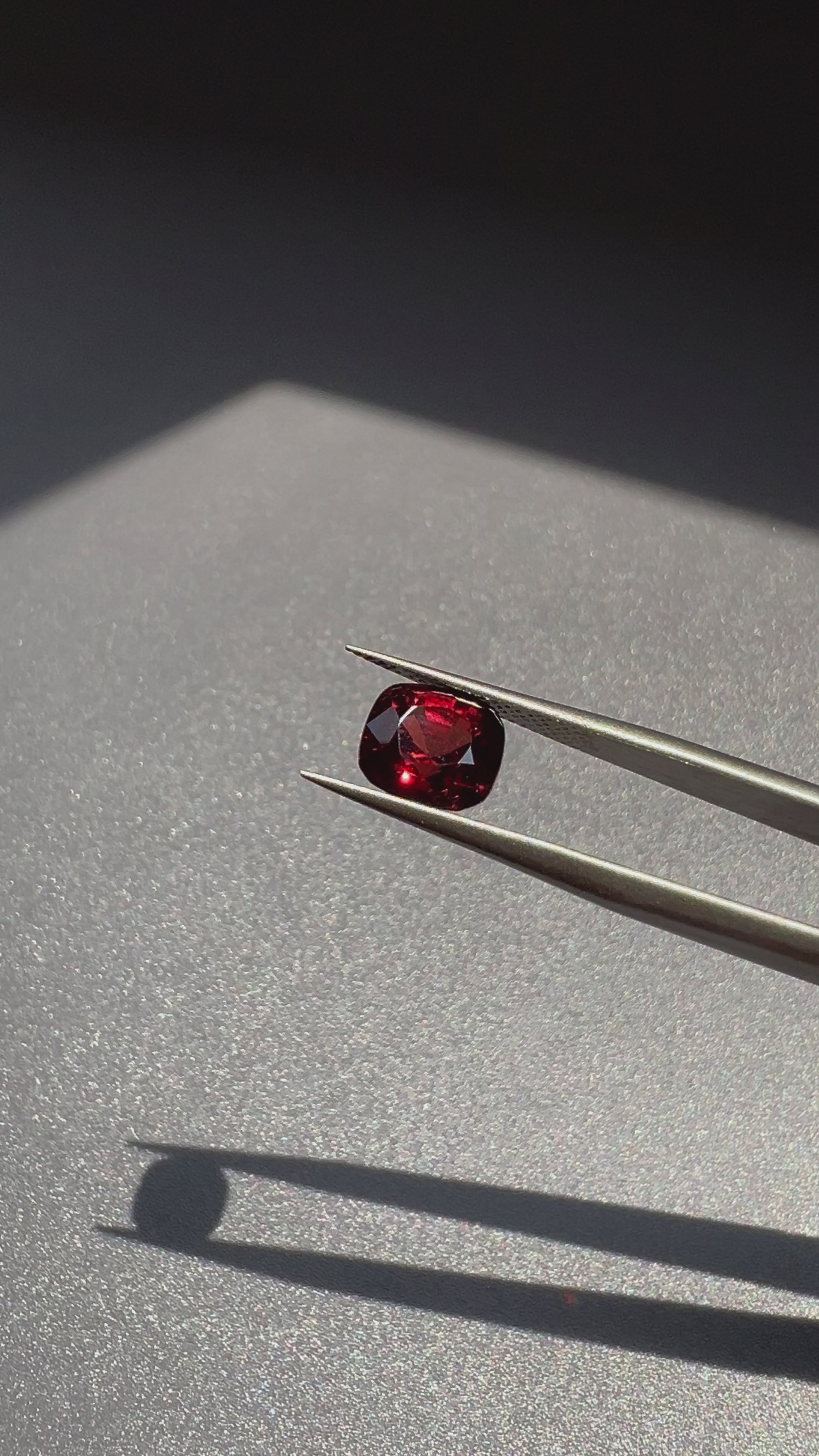 A deep, rich Burmese red spinel with a brilliant glow