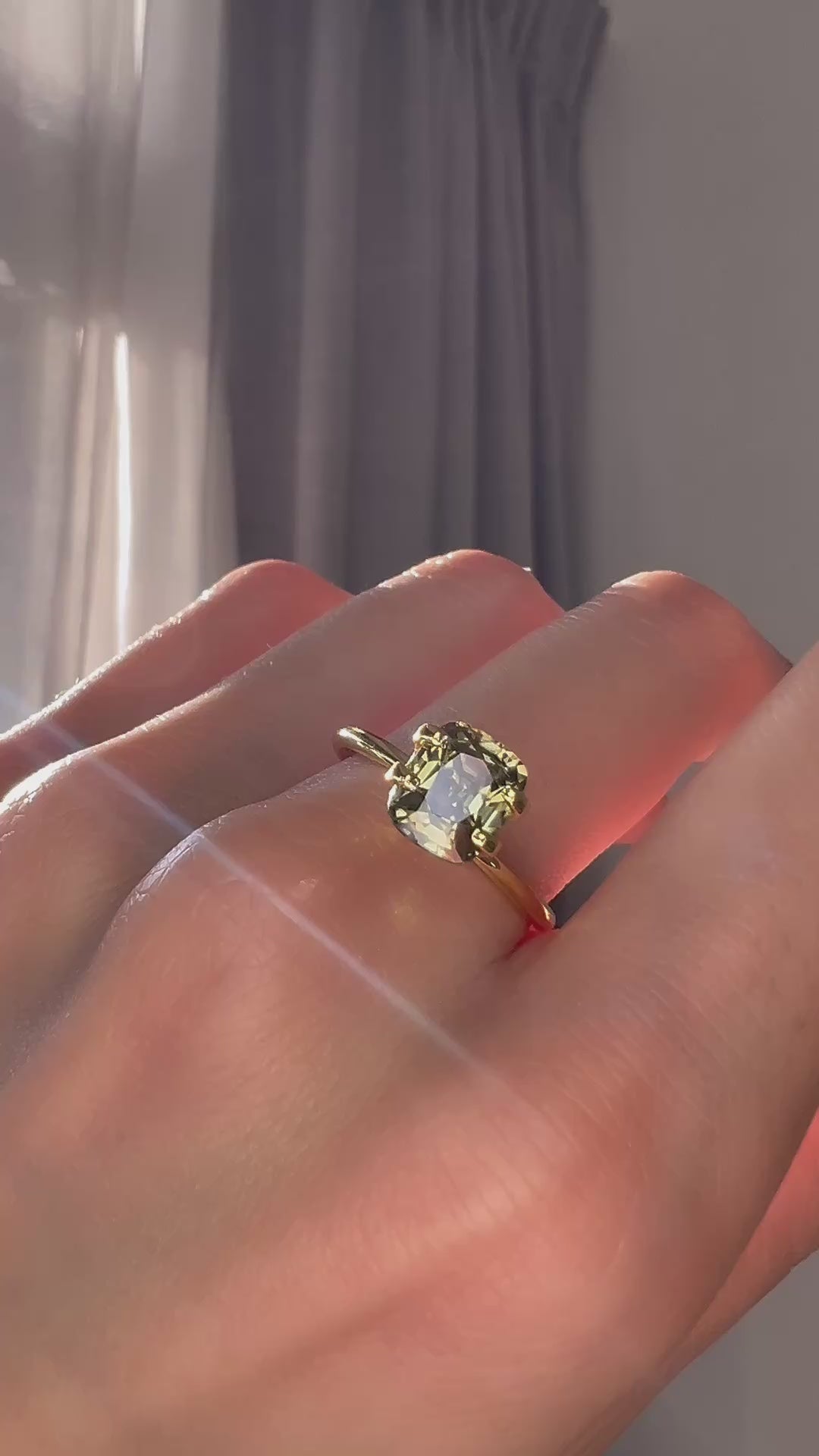 2.39ct rainforest dusk zircon from Burma – natural green gemstone by Modèle Jewellery Singapore