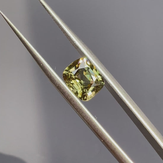 Natural 2.39ct green zircon gemstone from Burma – rare rainforest dusk hue with vibrant sparkle, available at Modèle Jewellery Singapore