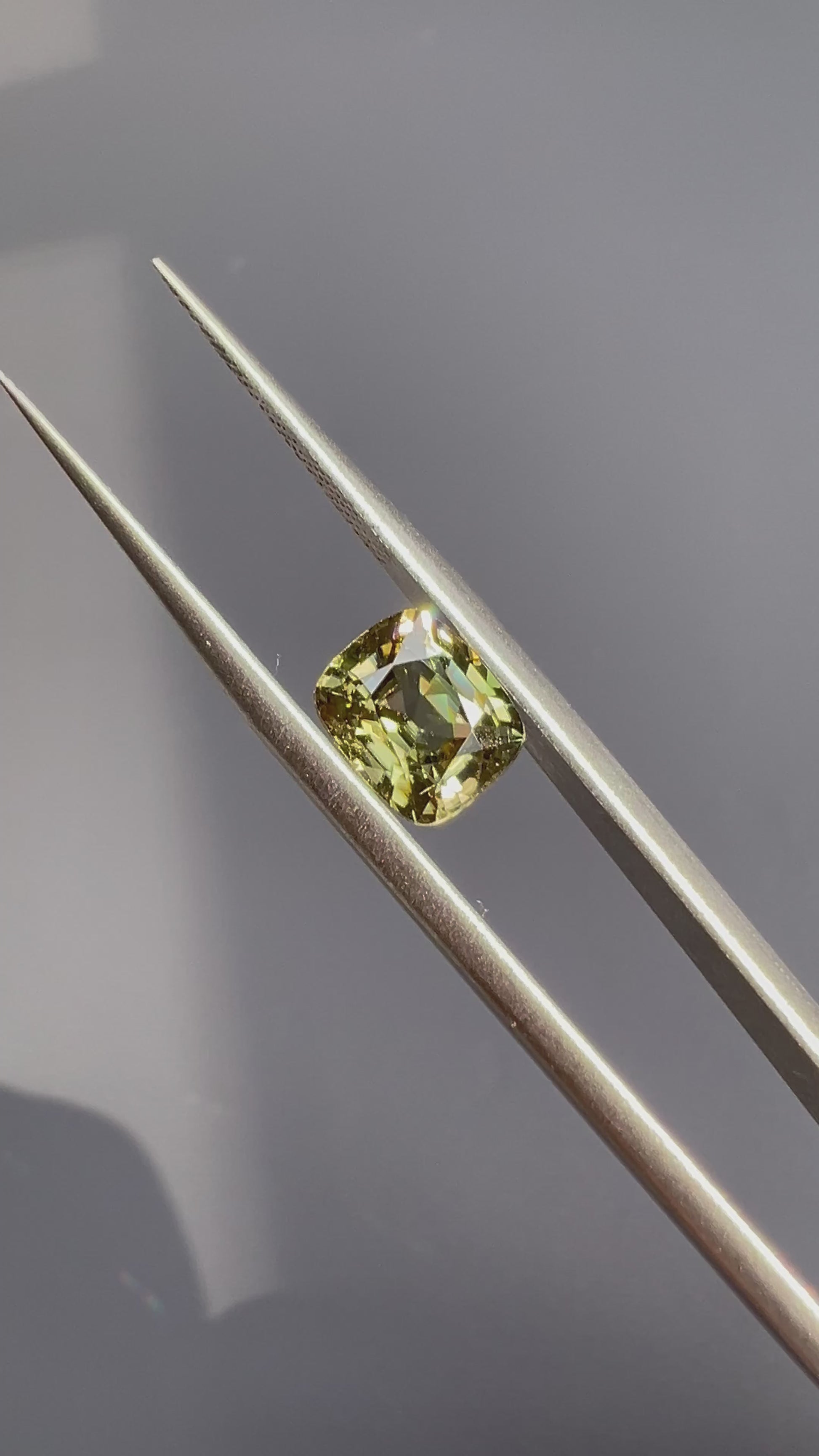 Natural 2.39ct green zircon gemstone from Burma – rare rainforest dusk hue with vibrant sparkle, available at Modèle Jewellery Singapore