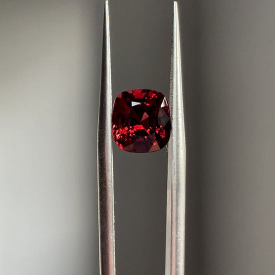 A deep, rich Burmese red spinel with a brilliant glow