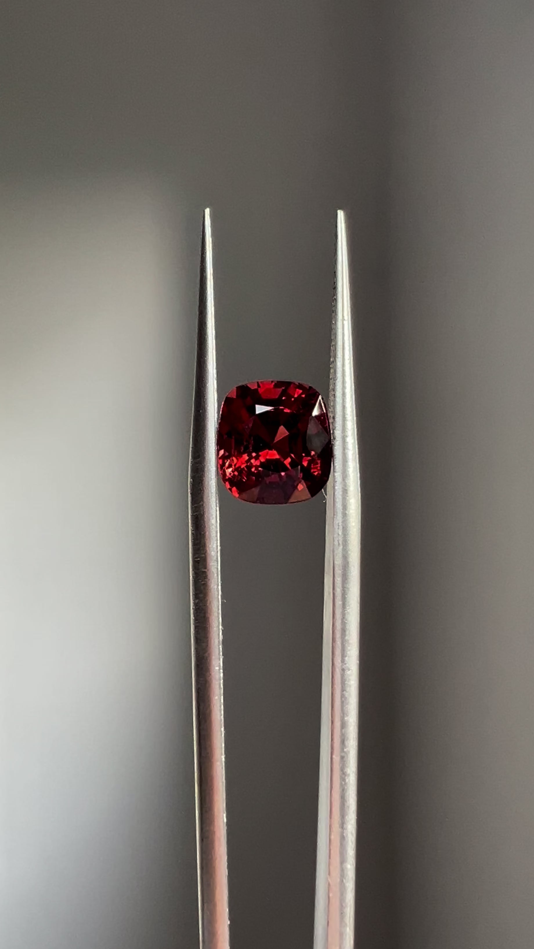 A deep, rich Burmese red spinel with a brilliant glow