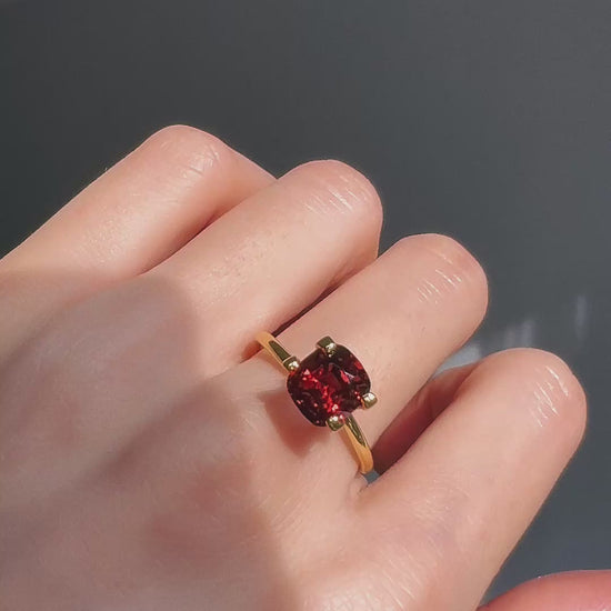 A deep, rich Burmese red spinel with a brilliant glow
