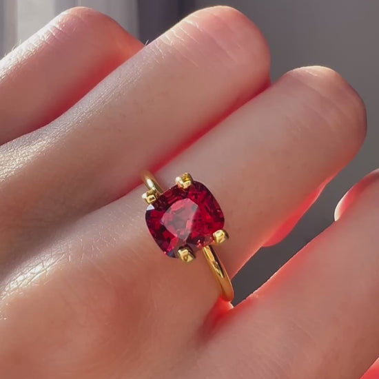A deep, rich Burmese red spinel with a brilliant glow
