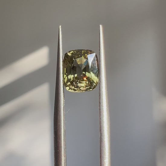 2.39ct Burmese green zircon – rainforest dusk color, rare natural gemstone at Modèle Jewellery Singapore