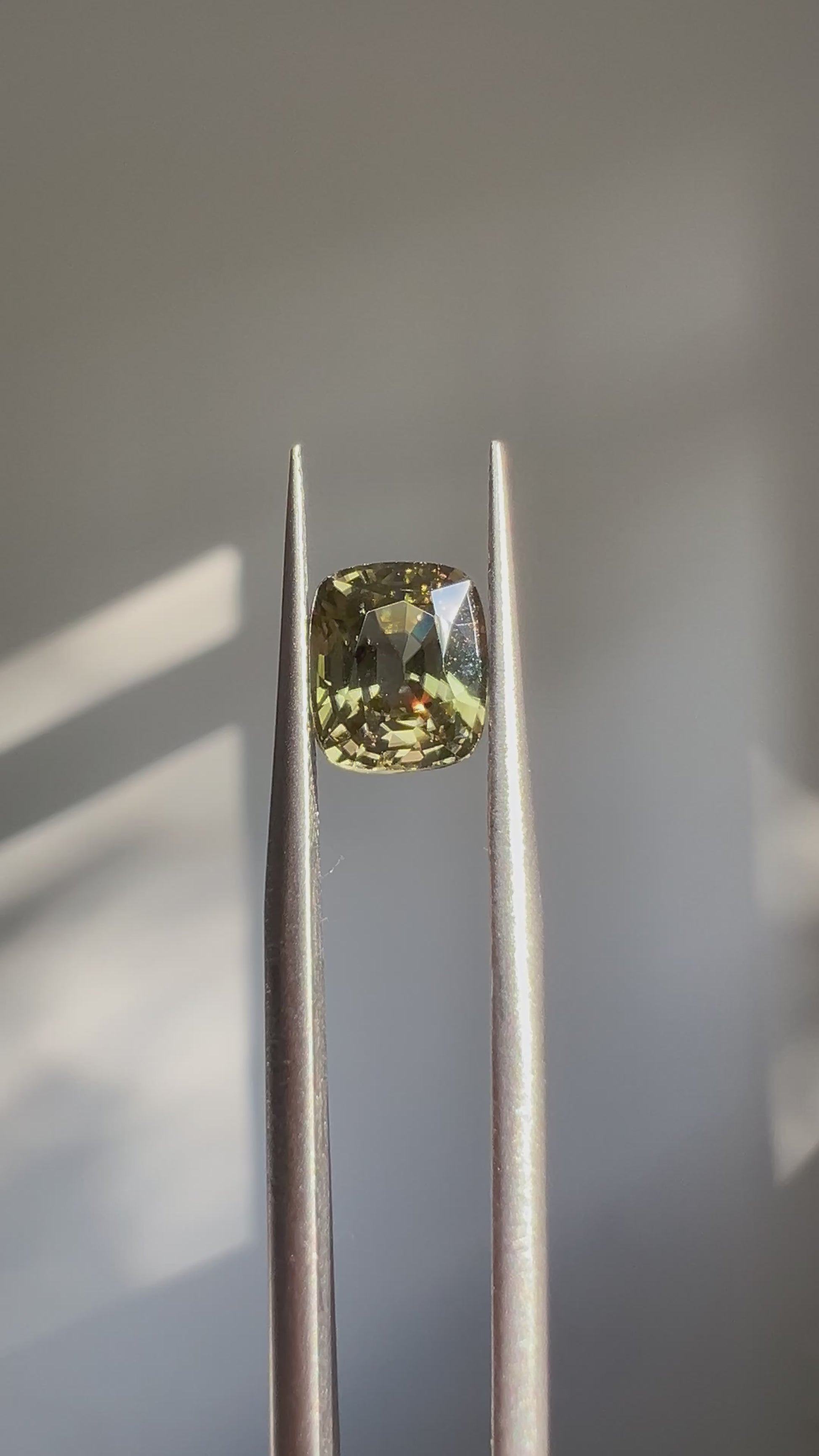 2.39ct Burmese green zircon – rainforest dusk color, rare natural gemstone at Modèle Jewellery Singapore