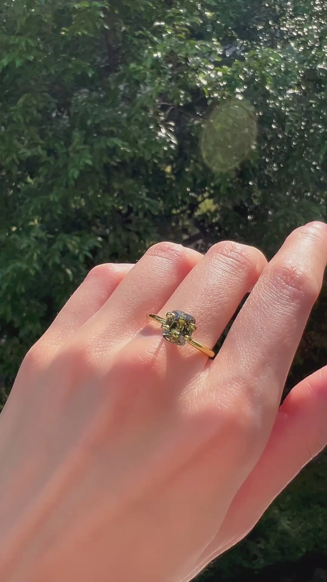 Natural green zircon gemstone 2.39ct – vibrant rainforest dusk from Burma, Modèle Jewellery Singapore